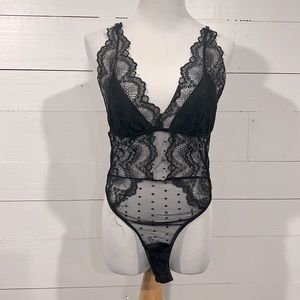 Nasty Gal black mesh bodysuit size L fits like M
